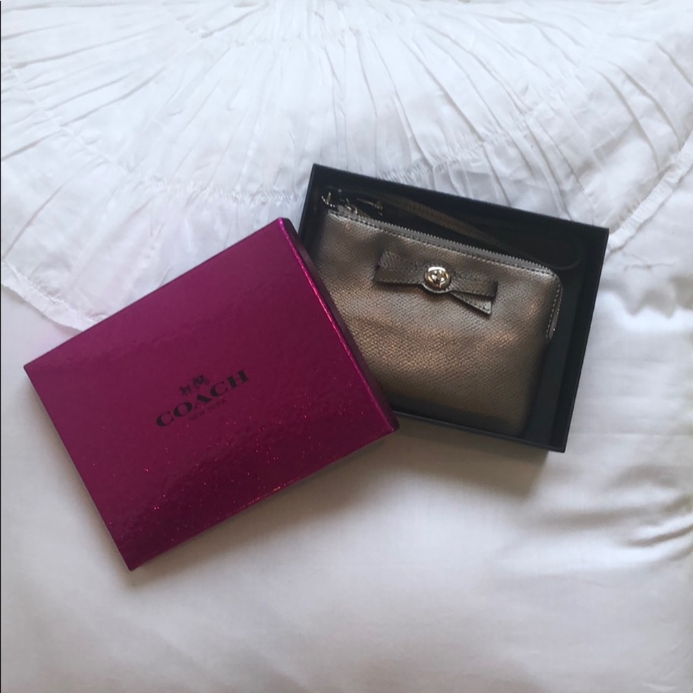 Never worn Coach metallic wristlet